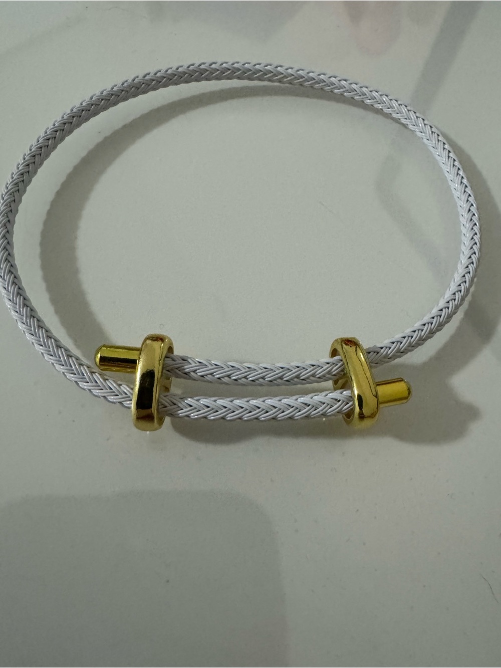 White Braided Cord Bracelet with Gold Accents